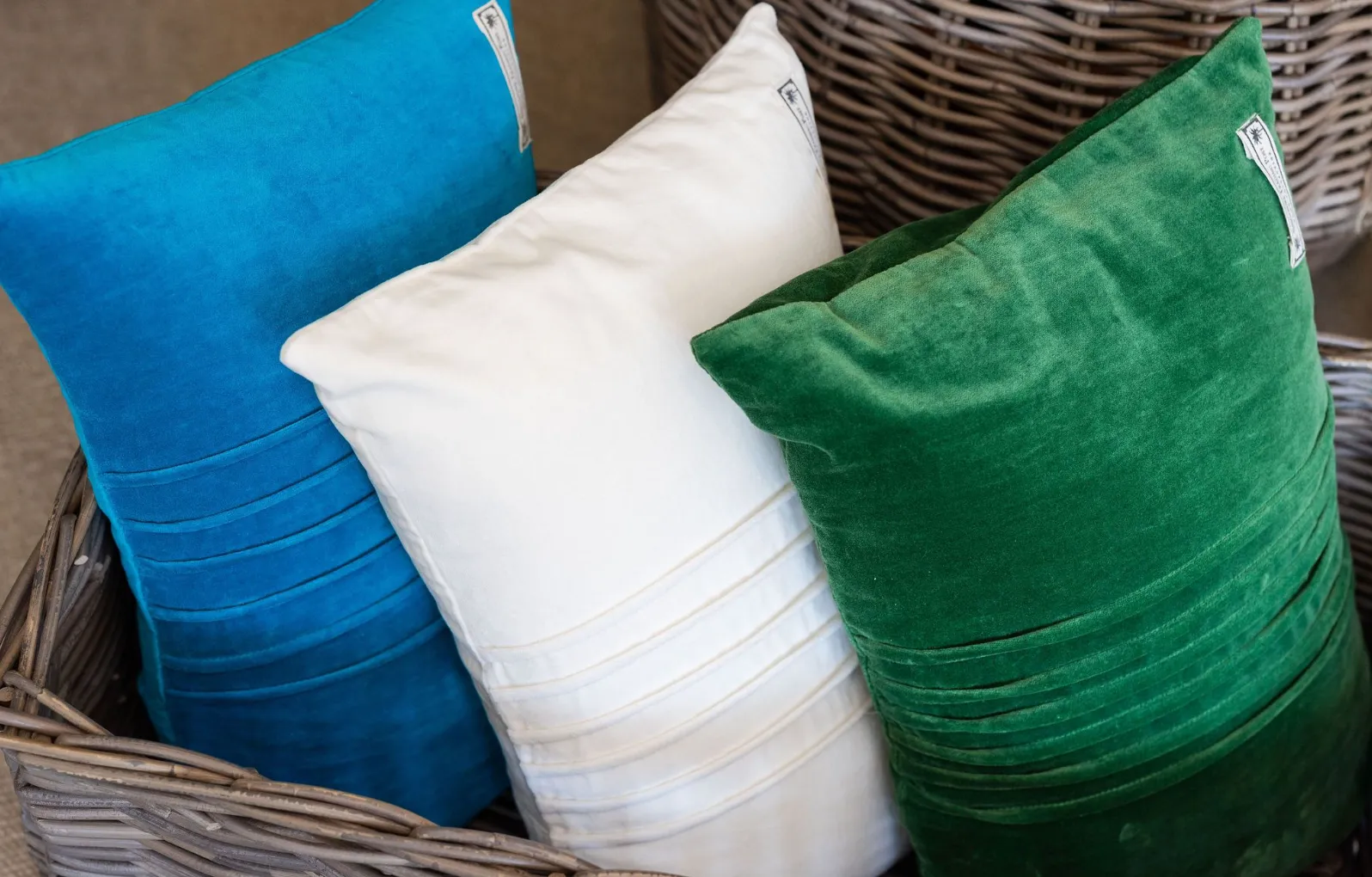 Velvet blue cushion with pin tuck detail