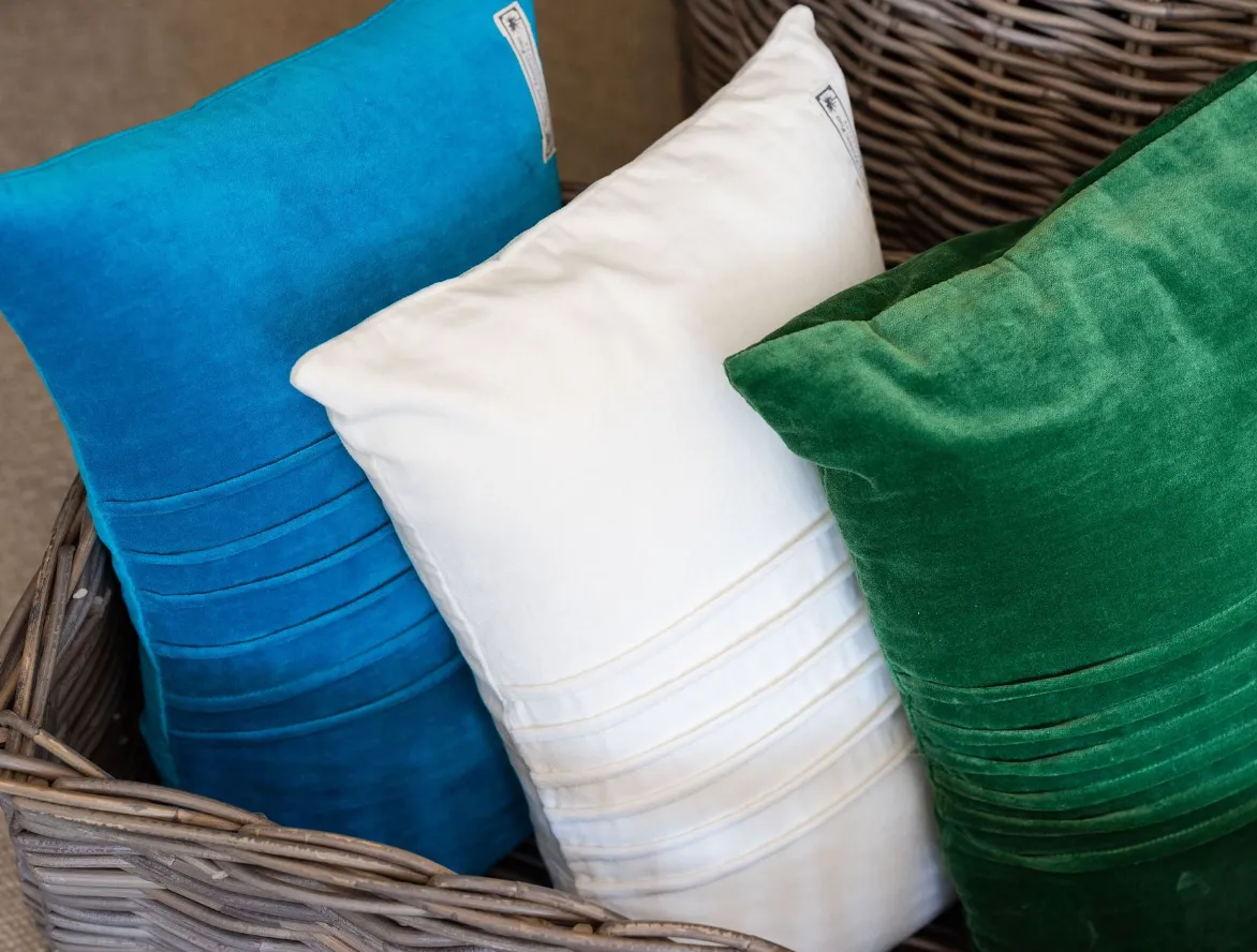 Velvet blue cushion with pin tuck detail