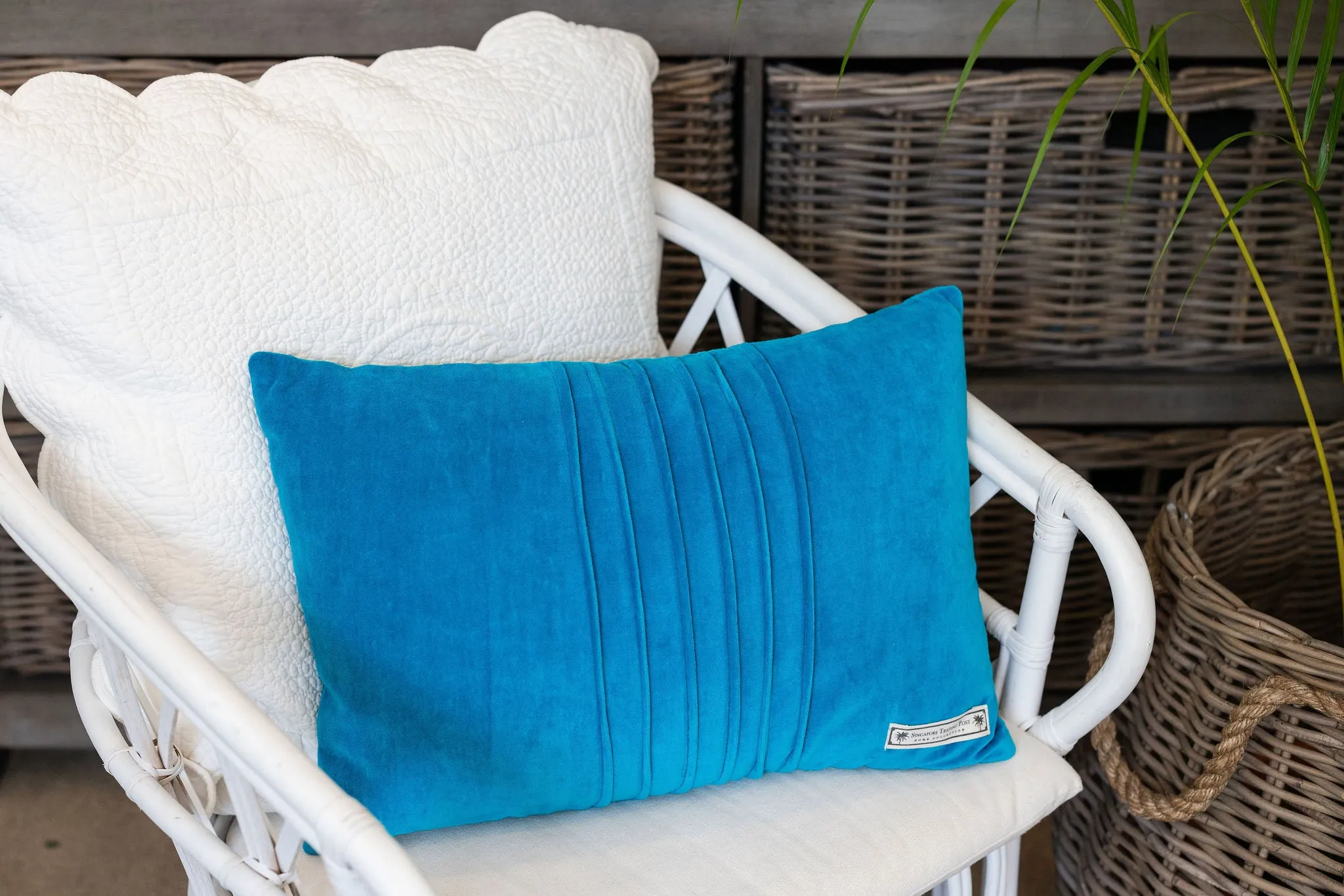 Velvet blue cushion with pin tuck detail
